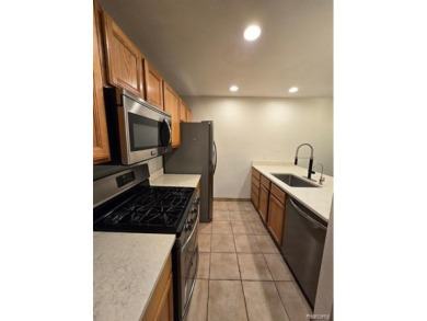 Welcome Home! This fully renovated 2-bedroom, 2-bath condo in on Fenton Farms Golf Club in Michigan - for sale on GolfHomes.com, golf home, golf lot