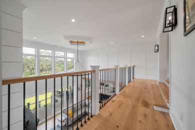 Set along the picturesque 11th hole of a Rees Jones Championship on The Golf Club At Briars Creek in South Carolina - for sale on GolfHomes.com, golf home, golf lot