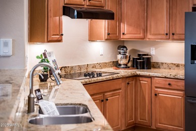 Step into refined luxury with this exquisite 2-bedroom + Den on Corte Bella Golf Club in Arizona - for sale on GolfHomes.com, golf home, golf lot