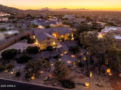 Welcome to this stunning Estrella custom home, situated on 1/2 on Estrella Mountain Ranch Golf Course in Arizona - for sale on GolfHomes.com, golf home, golf lot