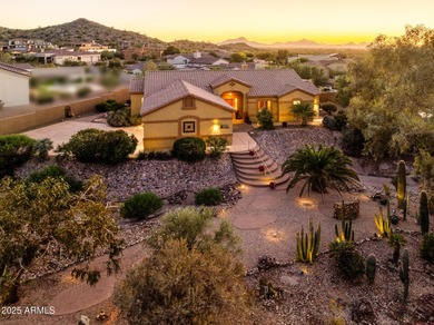 Welcome to this stunning Estrella custom home, situated on 1/2 on Estrella Mountain Ranch Golf Course in Arizona - for sale on GolfHomes.com, golf home, golf lot