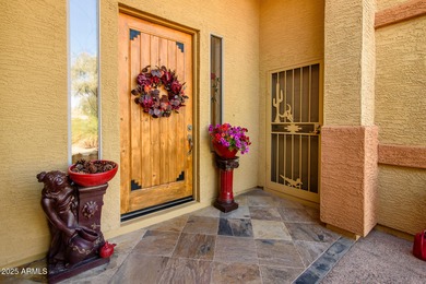 Welcome to this stunning Estrella custom home, situated on 1/2 on Estrella Mountain Ranch Golf Course in Arizona - for sale on GolfHomes.com, golf home, golf lot