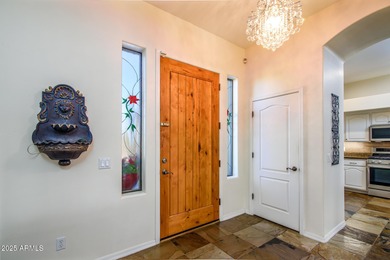 Welcome to this stunning Estrella custom home, situated on 1/2 on Estrella Mountain Ranch Golf Course in Arizona - for sale on GolfHomes.com, golf home, golf lot