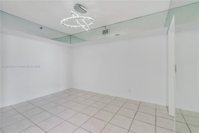 Experience luxury living in this elegant 2-bedroom, 2-bath on Turnberry Isle Resort and Club in Florida - for sale on GolfHomes.com, golf home, golf lot