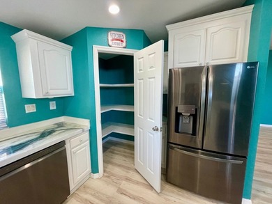 CHECK OUT THIS HOME in the sought after 55+ Gated Community of on Water Oak Country Club Estates in Florida - for sale on GolfHomes.com, golf home, golf lot