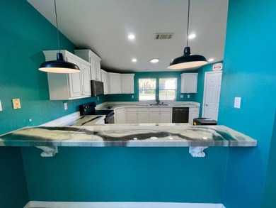 CHECK OUT THIS HOME in the sought after 55+ Gated Community of on Water Oak Country Club Estates in Florida - for sale on GolfHomes.com, golf home, golf lot