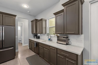 Your home in paradise awaits you. This immaculate 2 story on South Padre Island Golf Club in Texas - for sale on GolfHomes.com, golf home, golf lot