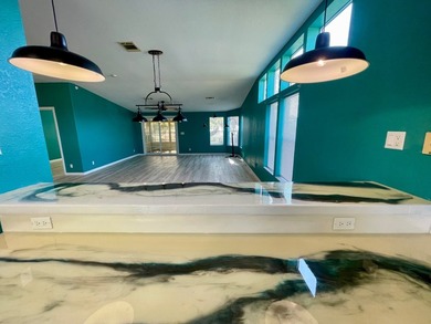 CHECK OUT THIS HOME in the sought after 55+ Gated Community of on Water Oak Country Club Estates in Florida - for sale on GolfHomes.com, golf home, golf lot