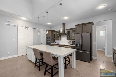 Your home in paradise awaits you. This immaculate 2 story on South Padre Island Golf Club in Texas - for sale on GolfHomes.com, golf home, golf lot