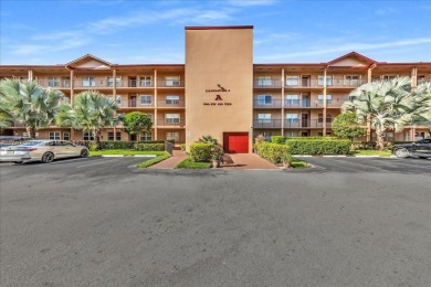 This beautiful 2-bedroom, 2-bathroom condo offers stunning pool on Flamingo Lakes Country Club in Florida - for sale on GolfHomes.com, golf home, golf lot