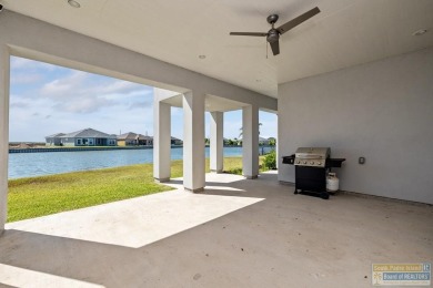 Your home in paradise awaits you. This immaculate 2 story on South Padre Island Golf Club in Texas - for sale on GolfHomes.com, golf home, golf lot
