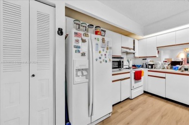 This beautiful 2-bedroom, 2-bathroom condo offers stunning pool on Flamingo Lakes Country Club in Florida - for sale on GolfHomes.com, golf home, golf lot