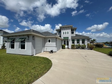 Your home in paradise awaits you. This immaculate 2 story on South Padre Island Golf Club in Texas - for sale on GolfHomes.com, golf home, golf lot
