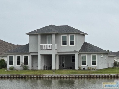 Your home in paradise awaits you. This immaculate 2 story on South Padre Island Golf Club in Texas - for sale on GolfHomes.com, golf home, golf lot