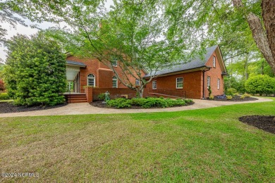 Nestled on 0.95 acre lot in the heart of Trent Woods, this on New Bern Golf and Country Club in North Carolina - for sale on GolfHomes.com, golf home, golf lot