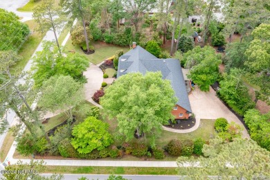 Nestled on 0.95 acre lot in the heart of Trent Woods, this on New Bern Golf and Country Club in North Carolina - for sale on GolfHomes.com, golf home, golf lot