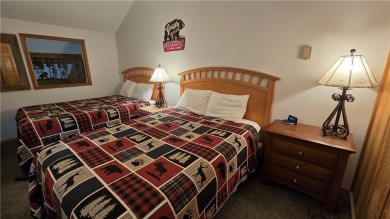 Enjoy all the perks of going to the cabin--without any of the on Lakewoods Forest Ridges Golf Club in Wisconsin - for sale on GolfHomes.com, golf home, golf lot