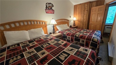Enjoy all the perks of going to the cabin--without any of the on Lakewoods Forest Ridges Golf Club in Wisconsin - for sale on GolfHomes.com, golf home, golf lot