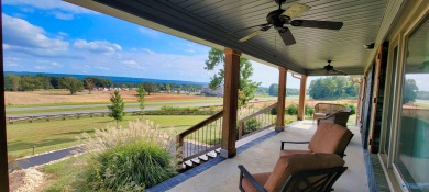 Welcome to this beautiful home or a unique investment on Scottsboro Golf and Country Club in Alabama - for sale on GolfHomes.com, golf home, golf lot