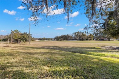 This 3 bedroom, 2 bath villa has a quiet location & backs to the on Emerald Greens Golf Resort and Country Club in Florida - for sale on GolfHomes.com, golf home, golf lot