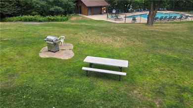 Enjoy all the perks of going to the cabin--without any of the on Lakewoods Forest Ridges Golf Club in Wisconsin - for sale on GolfHomes.com, golf home, golf lot
