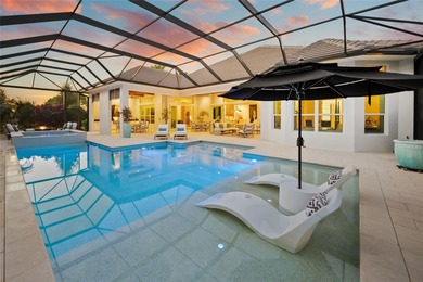 Nestled in the heart of Bradenton's most coveted enclave, this on Ritz-Carlton Members Golf Club in Florida - for sale on GolfHomes.com, golf home, golf lot