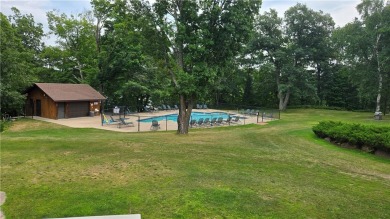 Enjoy all the perks of going to the cabin--without any of the on Lakewoods Forest Ridges Golf Club in Wisconsin - for sale on GolfHomes.com, golf home, golf lot
