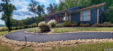 Welcome to this beautiful home or a unique investment on Scottsboro Golf and Country Club in Alabama - for sale on GolfHomes.com, golf home, golf lot