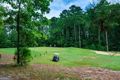 Southern Living home designed by L. Mitchell Ginn. Landscaping on Riverside Country Club in Alabama - for sale on GolfHomes.com, golf home, golf lot