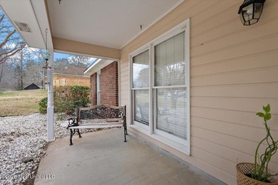 Absolutely beautiful 4 bedroom 2 bath -- foyer entry, formal on Castlewoods Golf Club in Mississippi - for sale on GolfHomes.com, golf home, golf lot