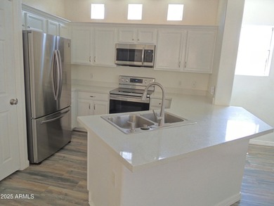 Wonderful detached home in Park Central at Augusta Ranch! This on Augusta Ranch Golf Club in Arizona - for sale on GolfHomes.com, golf home, golf lot