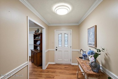 Absolutely beautiful 4 bedroom 2 bath -- foyer entry, formal on Castlewoods Golf Club in Mississippi - for sale on GolfHomes.com, golf home, golf lot