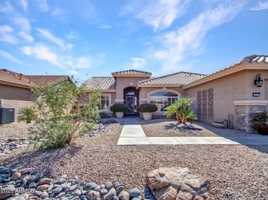 Beautifully maintained expanded Palmera model on the 14th green on Eagles Nest at Pebble Creek in Arizona - for sale on GolfHomes.com, golf home, golf lot