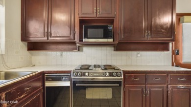 Spacious and bright 3-bedroom, 2-bath home located in the highly on Bay Point Resort Golf Club in Florida - for sale on GolfHomes.com, golf home, golf lot