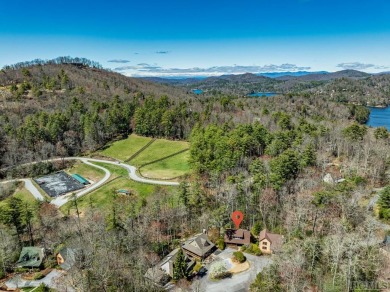 Experience the quintessential mountain getaway in this charming on Trillium Links in North Carolina - for sale on GolfHomes.com, golf home, golf lot