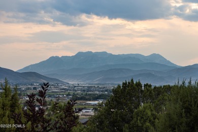This stunning mountain retreat offers panoramic views of Mt on Red Ledges Golf Club in Utah - for sale on GolfHomes.com, golf home, golf lot