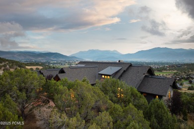 This stunning mountain retreat offers panoramic views of Mt on Red Ledges Golf Club in Utah - for sale on GolfHomes.com, golf home, golf lot