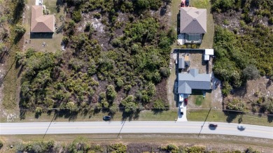 This 1/4 acre vacant lot is the perfect canvas to build your on Duffys Golf Center in Florida - for sale on GolfHomes.com, golf home, golf lot