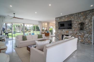 Stunning remodeled William Krisel-designed Mid-Centry Modern on Indian Wells Golf Resort and Country Club in California - for sale on GolfHomes.com, golf home, golf lot