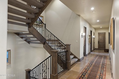 This stunning mountain retreat offers panoramic views of Mt on Red Ledges Golf Club in Utah - for sale on GolfHomes.com, golf home, golf lot