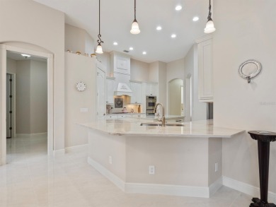 This stunning 4-bedroom, 3-bath pool home overlooking the 16th on DeBary Golf and Country Club in Florida - for sale on GolfHomes.com, golf home, golf lot