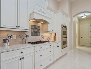 This stunning 4-bedroom, 3-bath pool home overlooking the 16th on DeBary Golf and Country Club in Florida - for sale on GolfHomes.com, golf home, golf lot