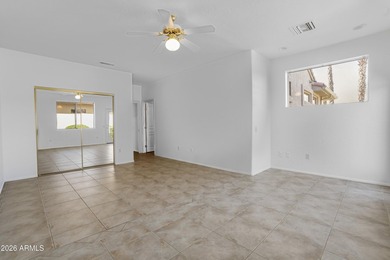 Located in The Point at The Grand in Surprise, this impeccably on Granite Falls Golf Club  in Arizona - for sale on GolfHomes.com, golf home, golf lot