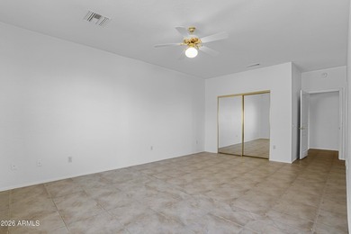 Located in The Point at The Grand in Surprise, this impeccably on Granite Falls Golf Club  in Arizona - for sale on GolfHomes.com, golf home, golf lot