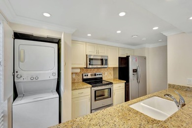 Rare first floor corner unit in Golf Villas, beautifully updated on PGA National Golf Club in Florida - for sale on GolfHomes.com, golf home, golf lot