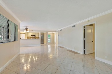 Rare first floor corner unit in Golf Villas, beautifully updated on PGA National Golf Club in Florida - for sale on GolfHomes.com, golf home, golf lot