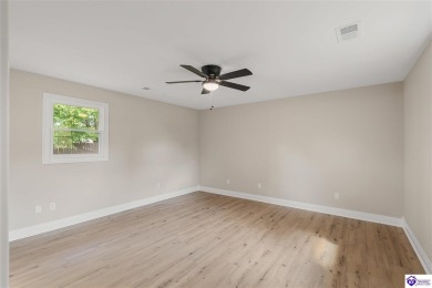 Welcome to this beautifully renovated 4-bedroom, 2.5-bath home on Elizabethtown Country Club in Kentucky - for sale on GolfHomes.com, golf home, golf lot