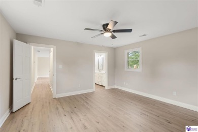 Welcome to this beautifully renovated 4-bedroom, 2.5-bath home on Elizabethtown Country Club in Kentucky - for sale on GolfHomes.com, golf home, golf lot