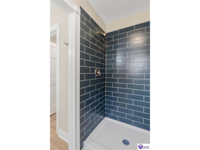 Welcome to this beautifully renovated 4-bedroom, 2.5-bath home on Elizabethtown Country Club in Kentucky - for sale on GolfHomes.com, golf home, golf lot