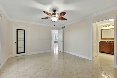 Rare first floor corner unit in Golf Villas, beautifully updated on PGA National Golf Club in Florida - for sale on GolfHomes.com, golf home, golf lot